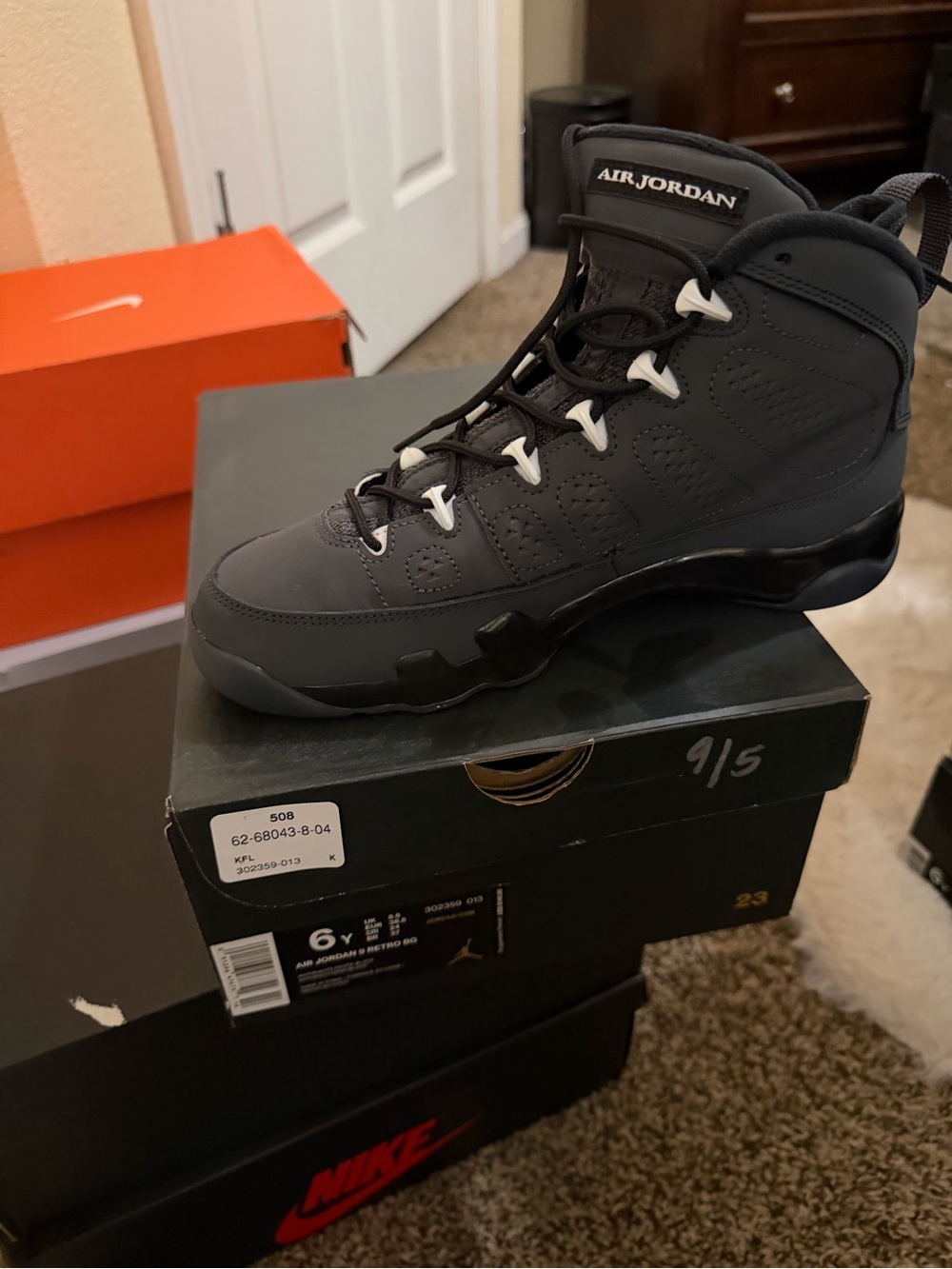 Jordan Men's Black and White High-Top Sneakers